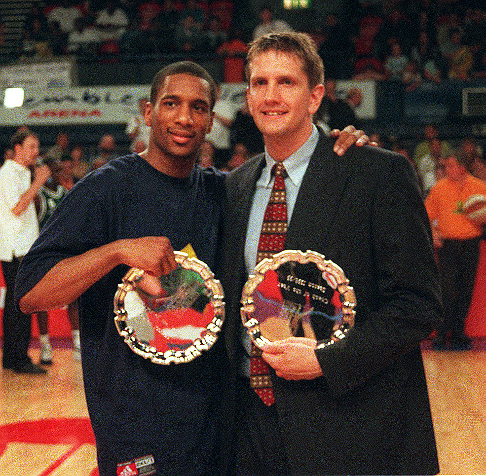 Terrell Myers & Chris Finch with Player and Coach of the Year awards